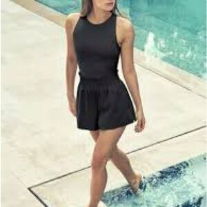 ATHLETA Cosmic Flutter Romper 4" Inseam Zip Racerback High Neck Black Size M